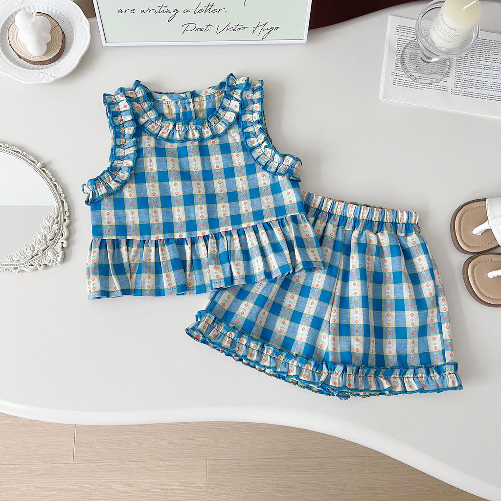 Korean-style girls' summer three-piece set with plaid polyester fabric, featuring a top, skirt, and shorts from Dropshipman.