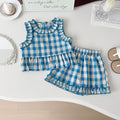 Korean-style girls' summer three-piece set with plaid polyester fabric, featuring a top, skirt, and shorts from Dropshipman.