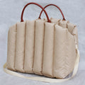 Portable pet carrier for car travel by Dropshipman, showing a sturdy, ventilated design with secure zippers and handles for pets.