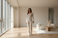 Women's relaxed-fit striped wide-leg pants set by Dropshipman, featuring a comfortable, casual style with a matching top and pants.