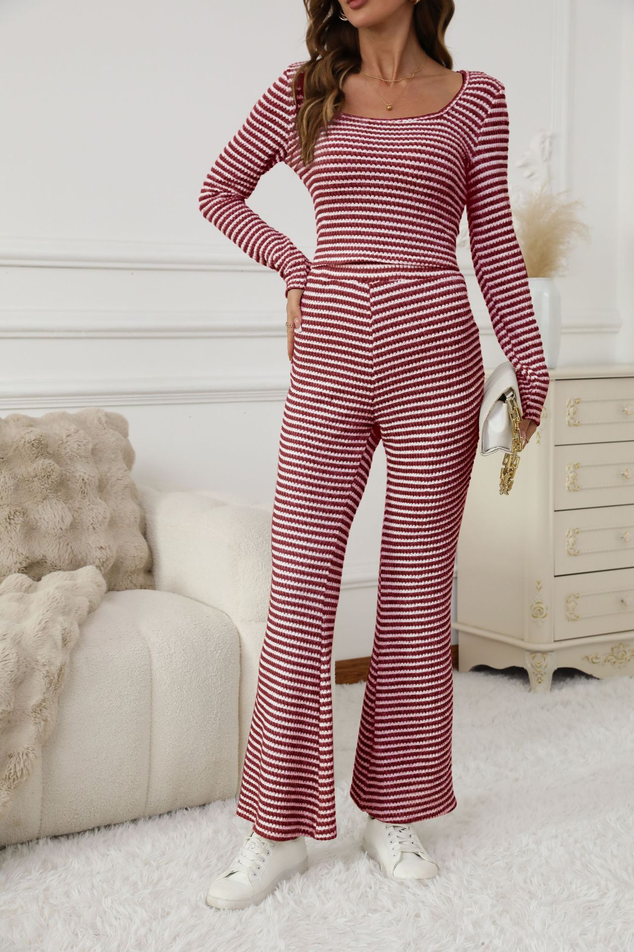 Women's relaxed-fit striped wide-leg pants set by Dropshipman, featuring a comfortable and stylish casual two-piece outfit.