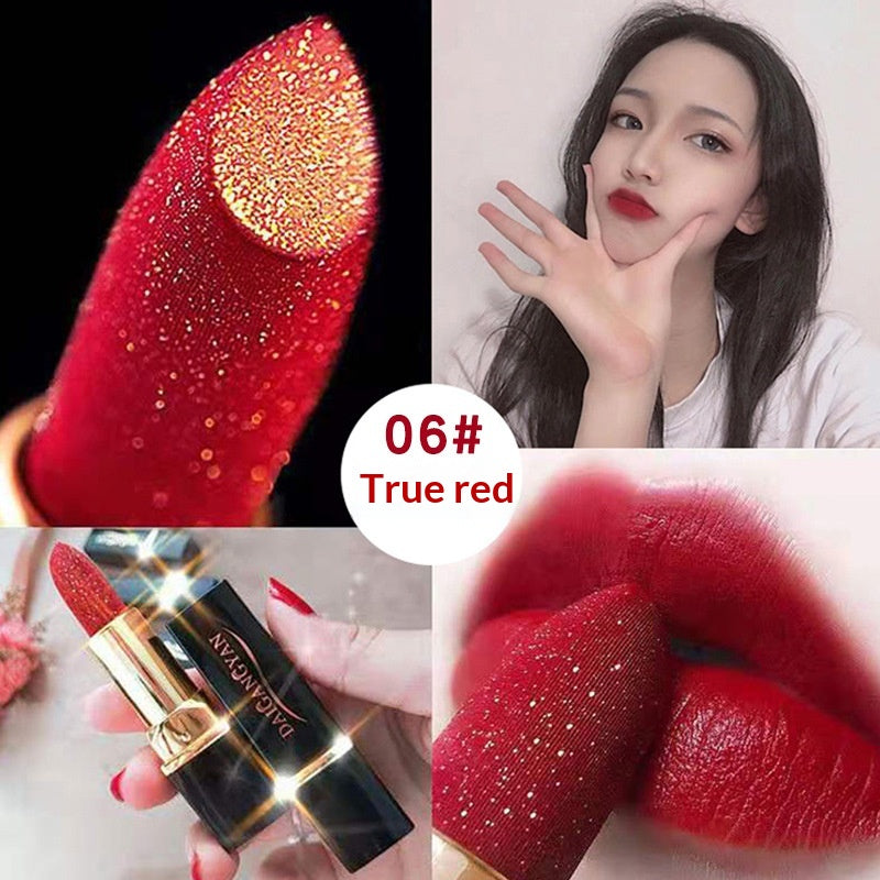 Golden diamond shimmer lipstick from Dropshipman with a velvet matte finish, showcasing the luxurious packaging and rich color.