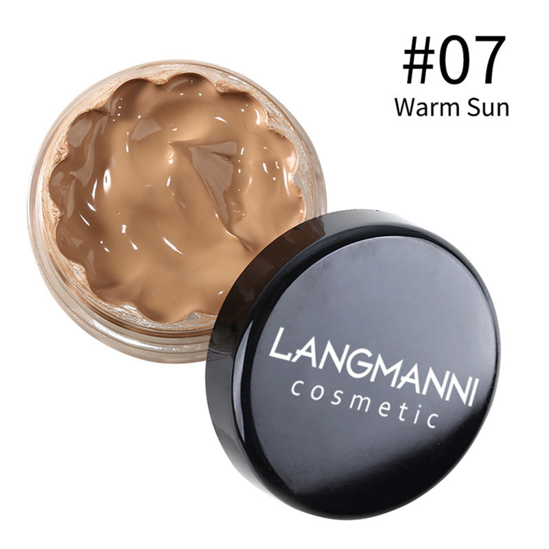 Dropshipman foundation in 12 shade options, featuring a close-up of the creamy, blendable makeup product in a sleek container.