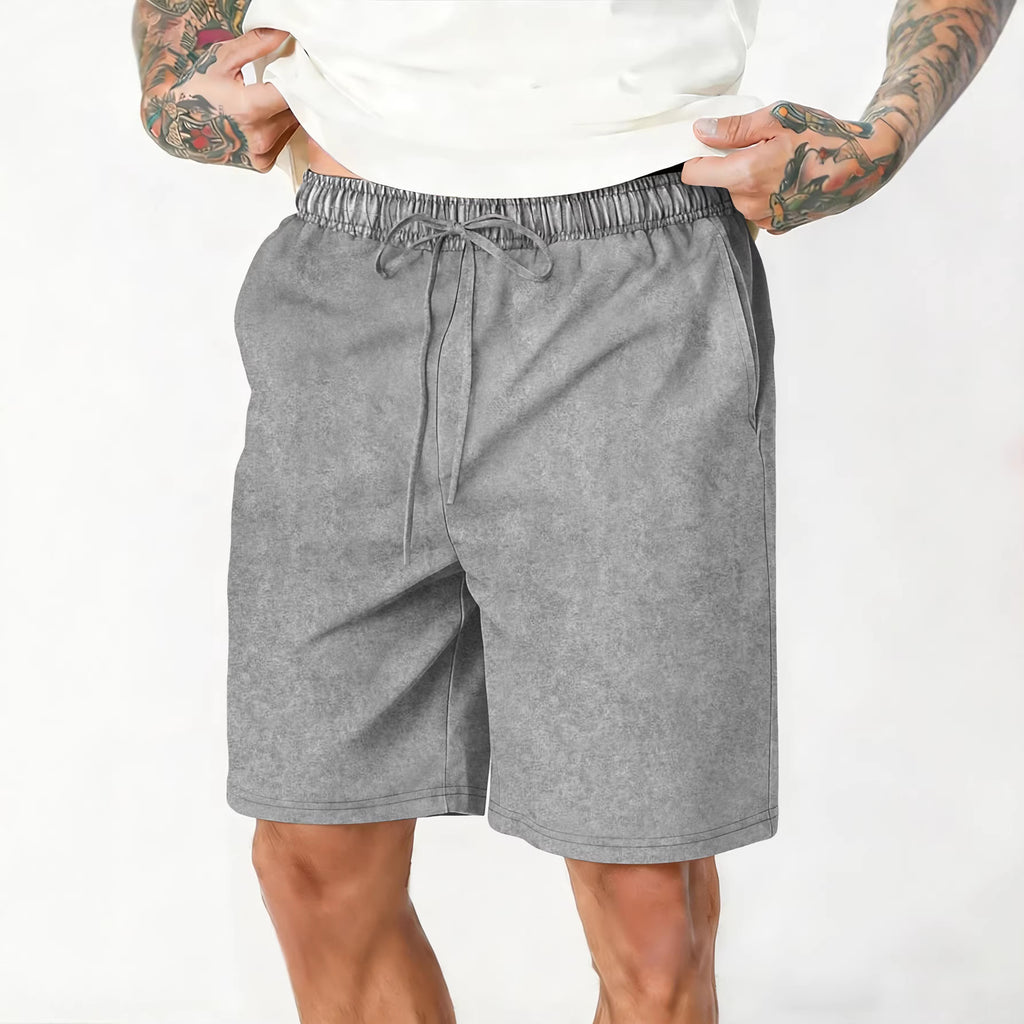 Relaxed-fit washed and distressed casual shorts by Dropshipman, showing front view with frayed edges and faded denim look.