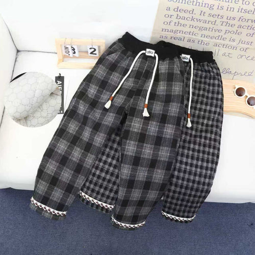 Checked cotton trousers from Dropshipman featuring a classic pattern and tailored fit, displayed on a neutral background.