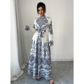 Elegant Arabic women's dress in European and American style, featuring intricate patterns and flowing fabric, by Dropshipman.