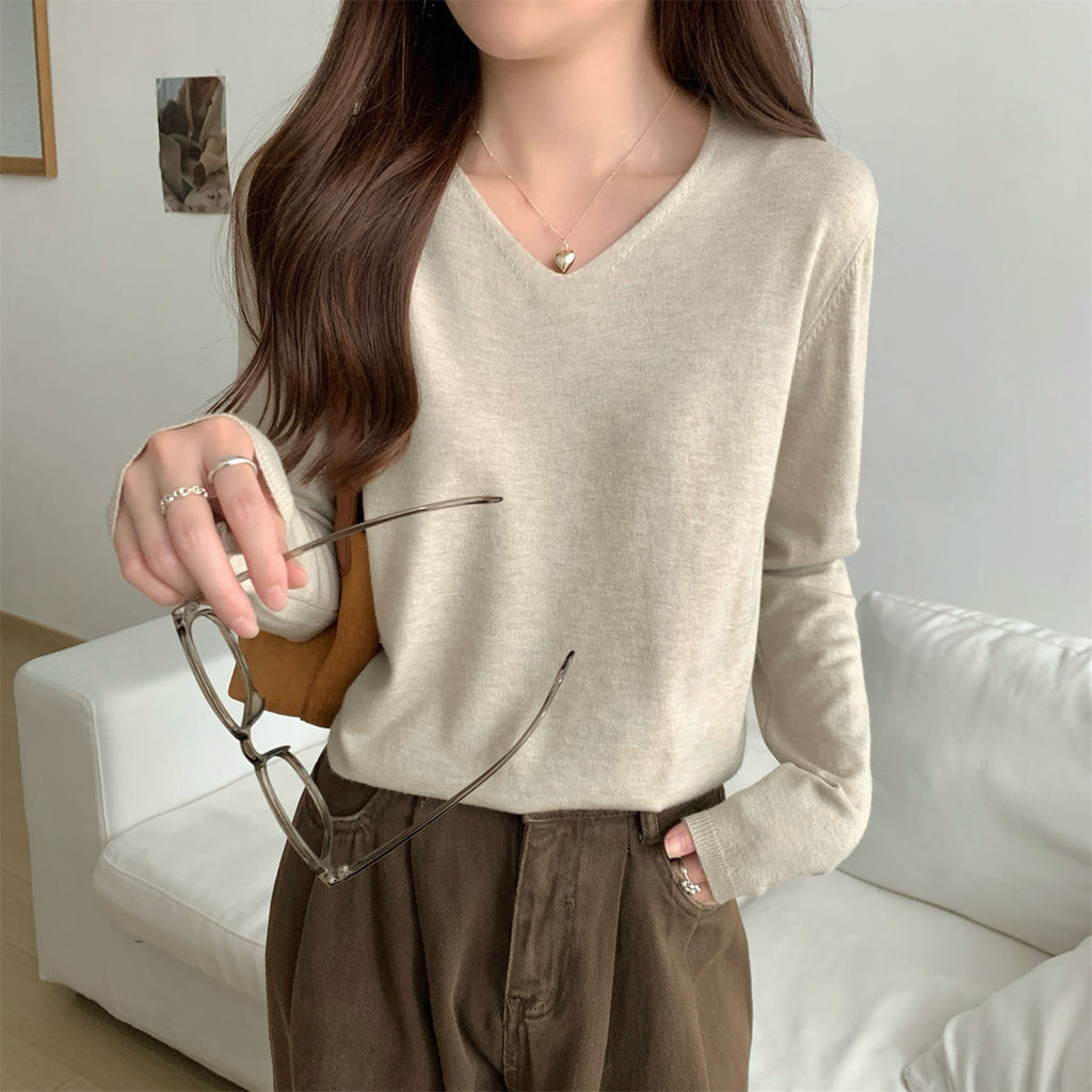 Women's loose V-neck cozy sweater by Dropshipman, soft and perfect for layering in a casual, relaxed style.
