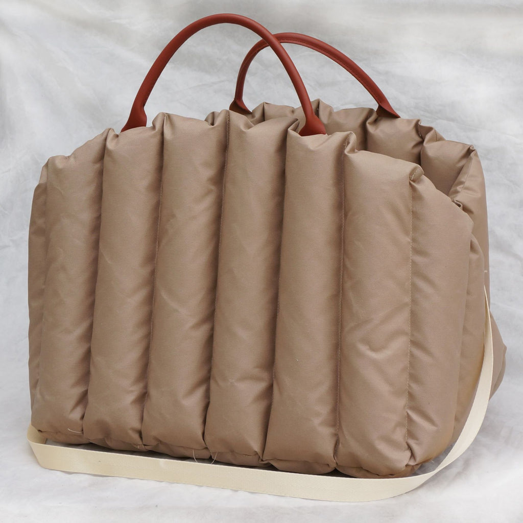 Portable pet carrier for car travel by Dropshipman, showing a secure, breathable design with handles for easy transport.