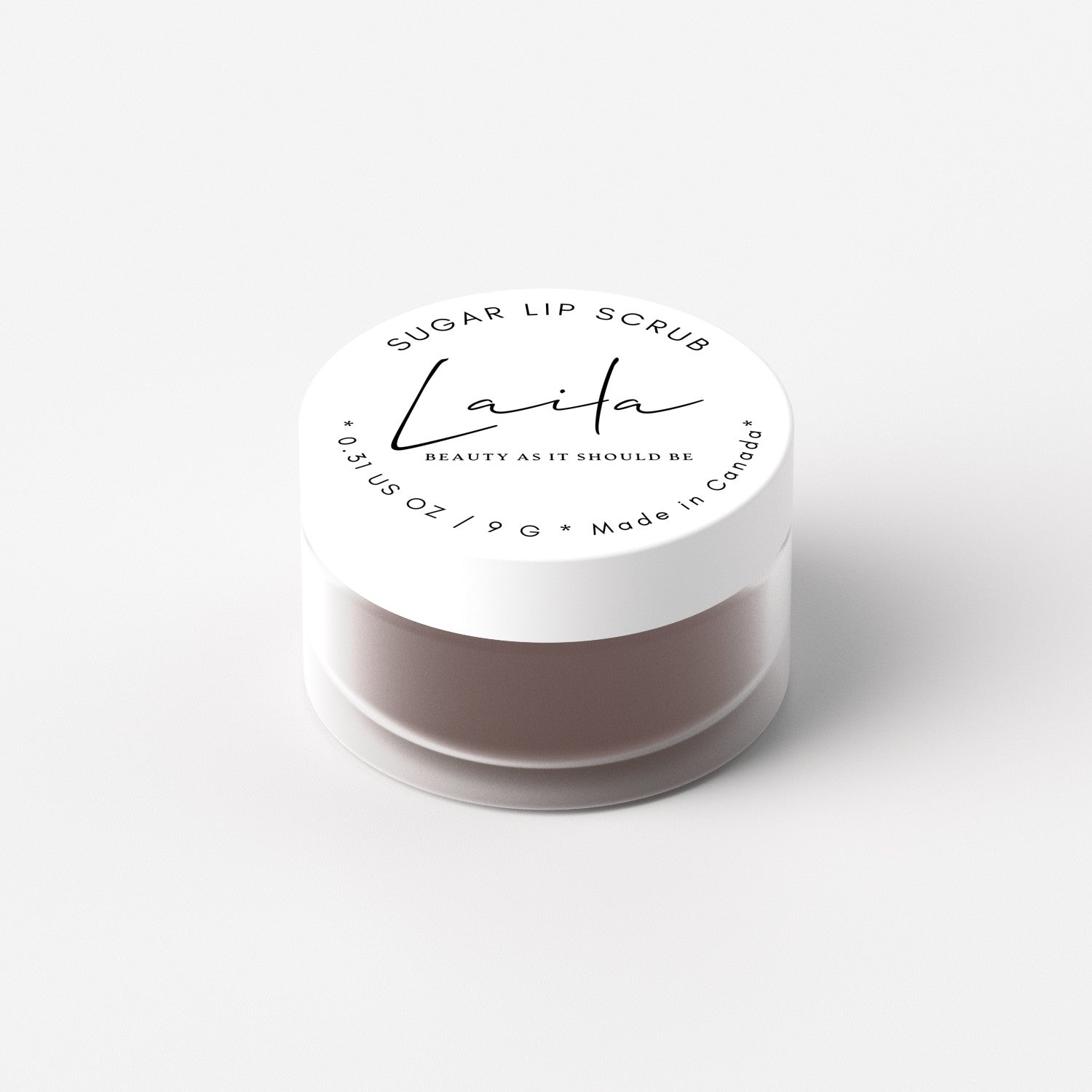 Laila Chocolate Lip Scrub in a jar, featuring a rich chocolate-colored sugar scrub with a smooth, textured surface for lip exfoliation.