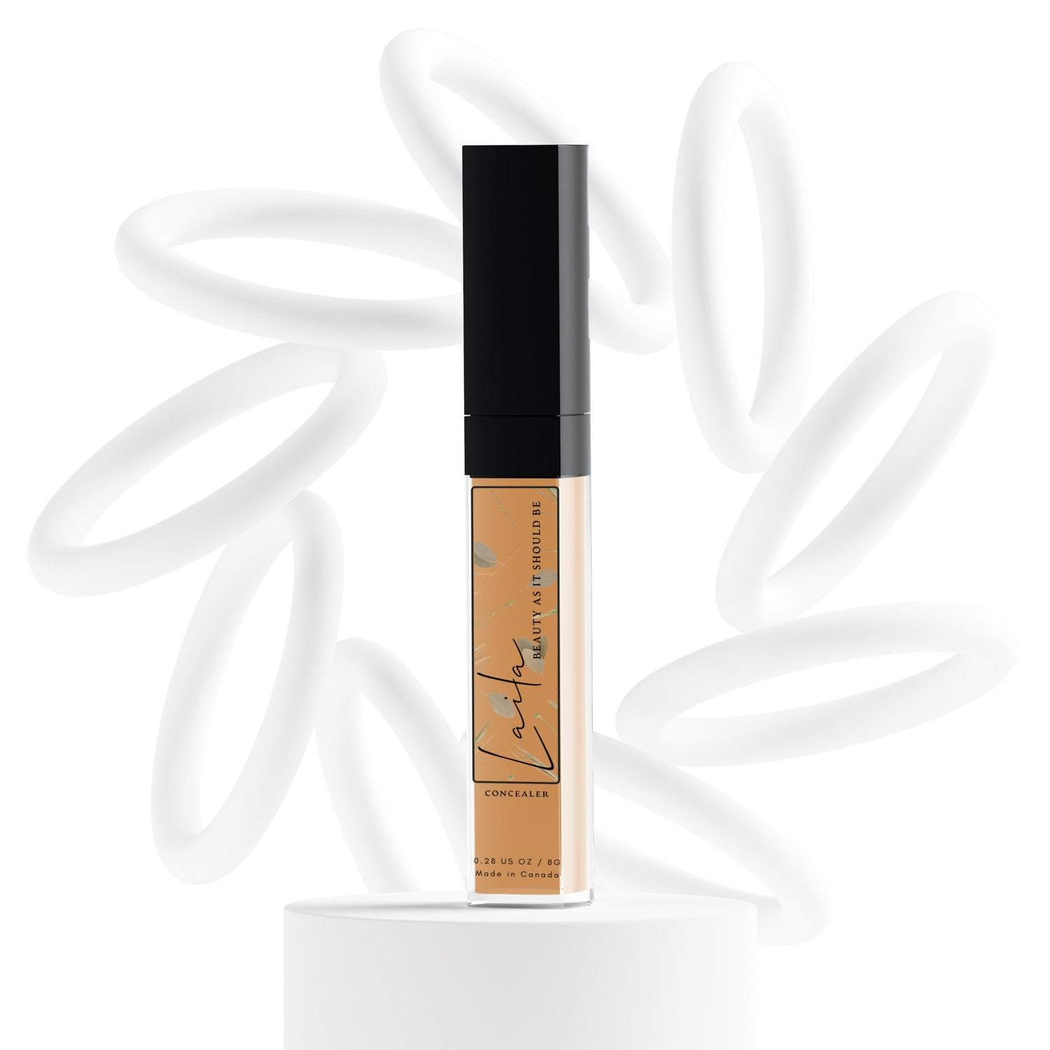 Laila dark tan concealer with cool undertone in a sleek tube, designed for concealing imperfections and evening skin tone.