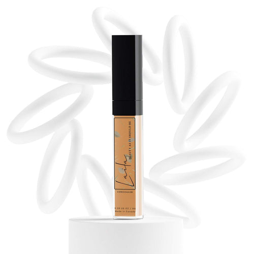 Laila dark tan concealer with cool undertone in a sleek tube, designed for concealing imperfections and evening skin tone.