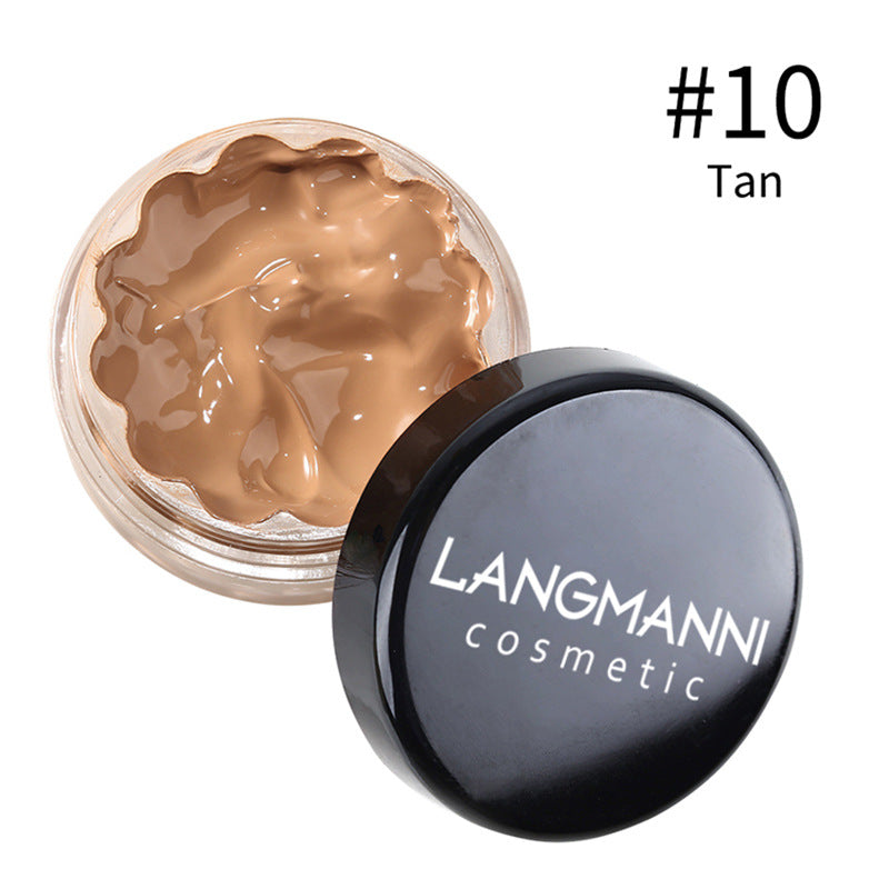 Dropshipman foundation in one of 12 shades, showing a close-up of the creamy liquid makeup in a sleek bottle.