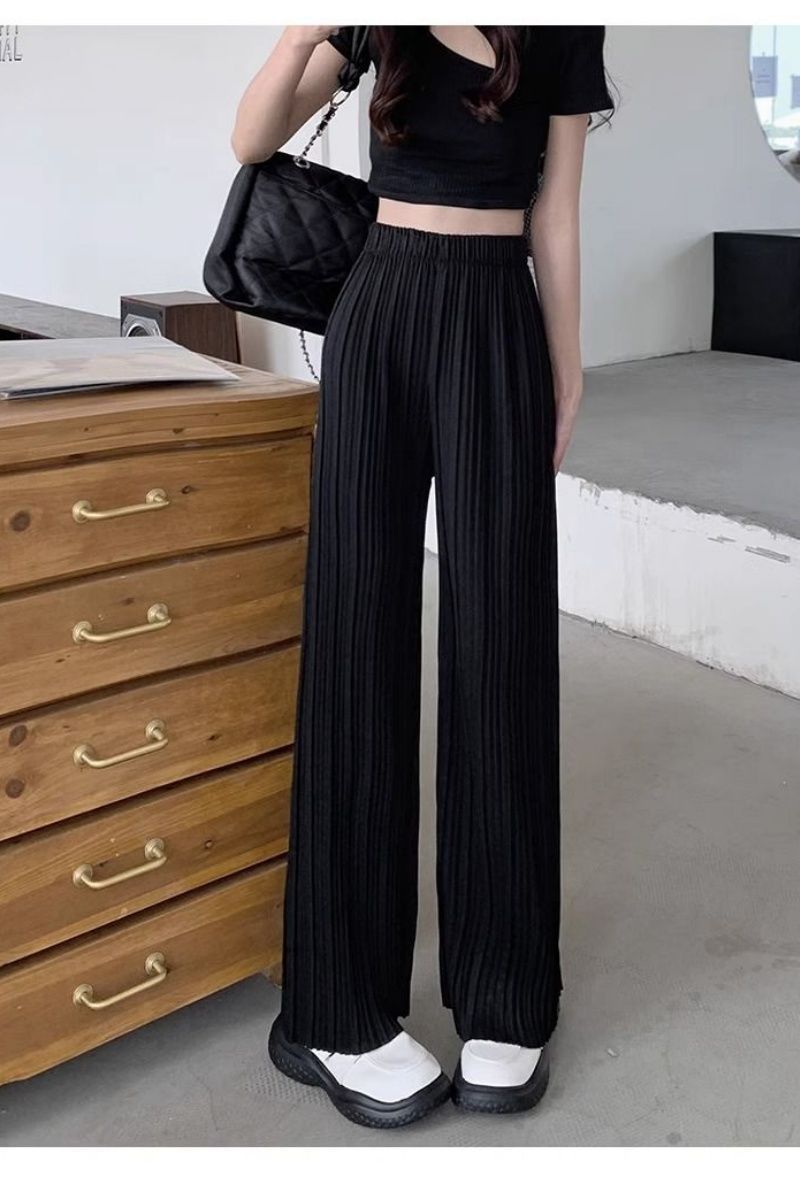 Women's high-waisted, pleated lightweight casual pants with draping design by Dropshipman, shown in a relaxed fit.