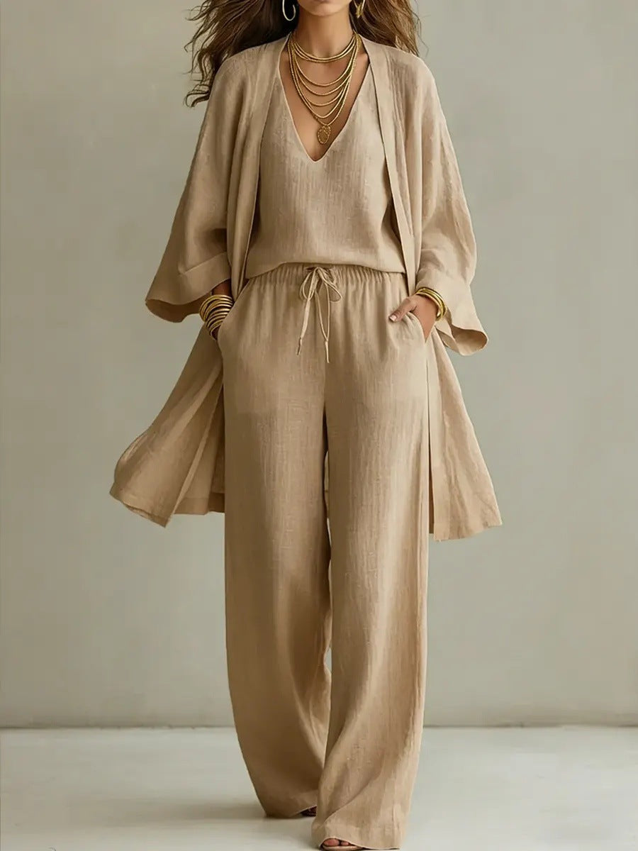 Women's solid color V-neck cardigan vest with pockets and long pants three-piece set by Dropshipman, shown on a model.