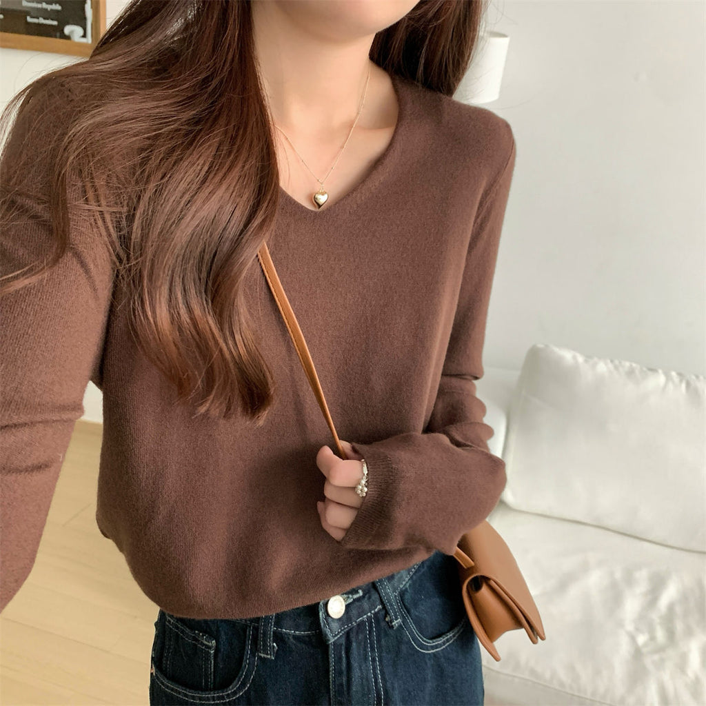 Women's loose V-neck cozy sweater by Dropshipman, featuring soft fabric and perfect for layering.