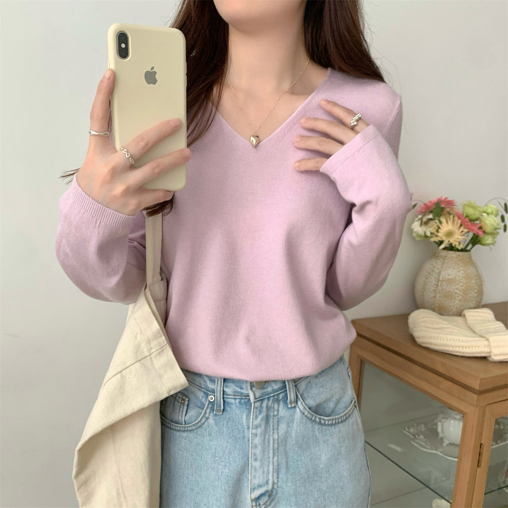 Women's loose V-neck cozy sweater by Dropshipman, soft knit fabric, perfect for layering and casual wear.