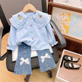 Cute embroidered collar shirt and denim jeans two-piece set for girls, featuring a stylish and comfortable design from Dropshipman.