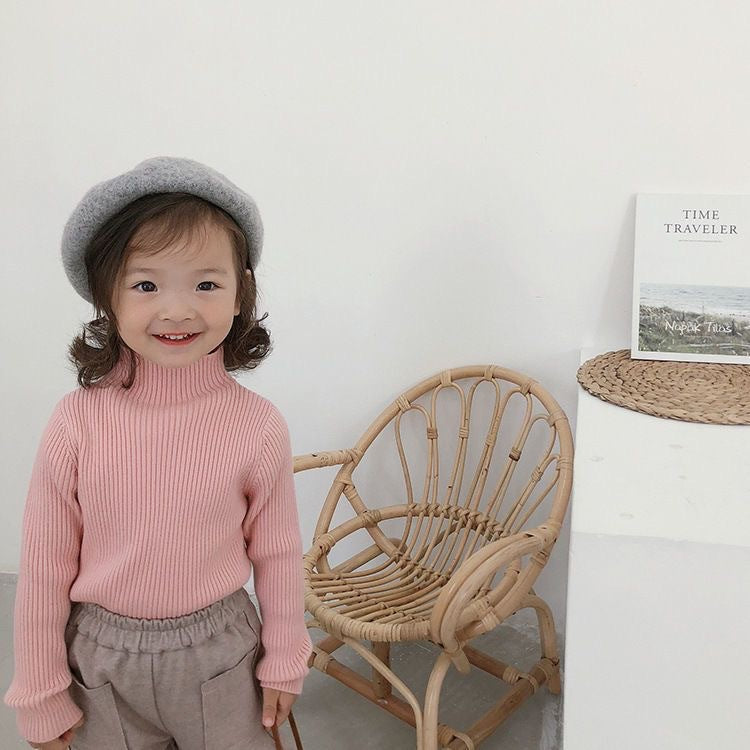 Soft, stretchy pilling-resistant knitted base-layer sweater for girls by Dropshipman, showing the cozy, fitted design and ribbed cuffs.