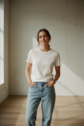 Women’s classic cotton T-shirt by ShopSweetHaven, displayed in a casual lifestyle setting with a relaxed fit and simple design.