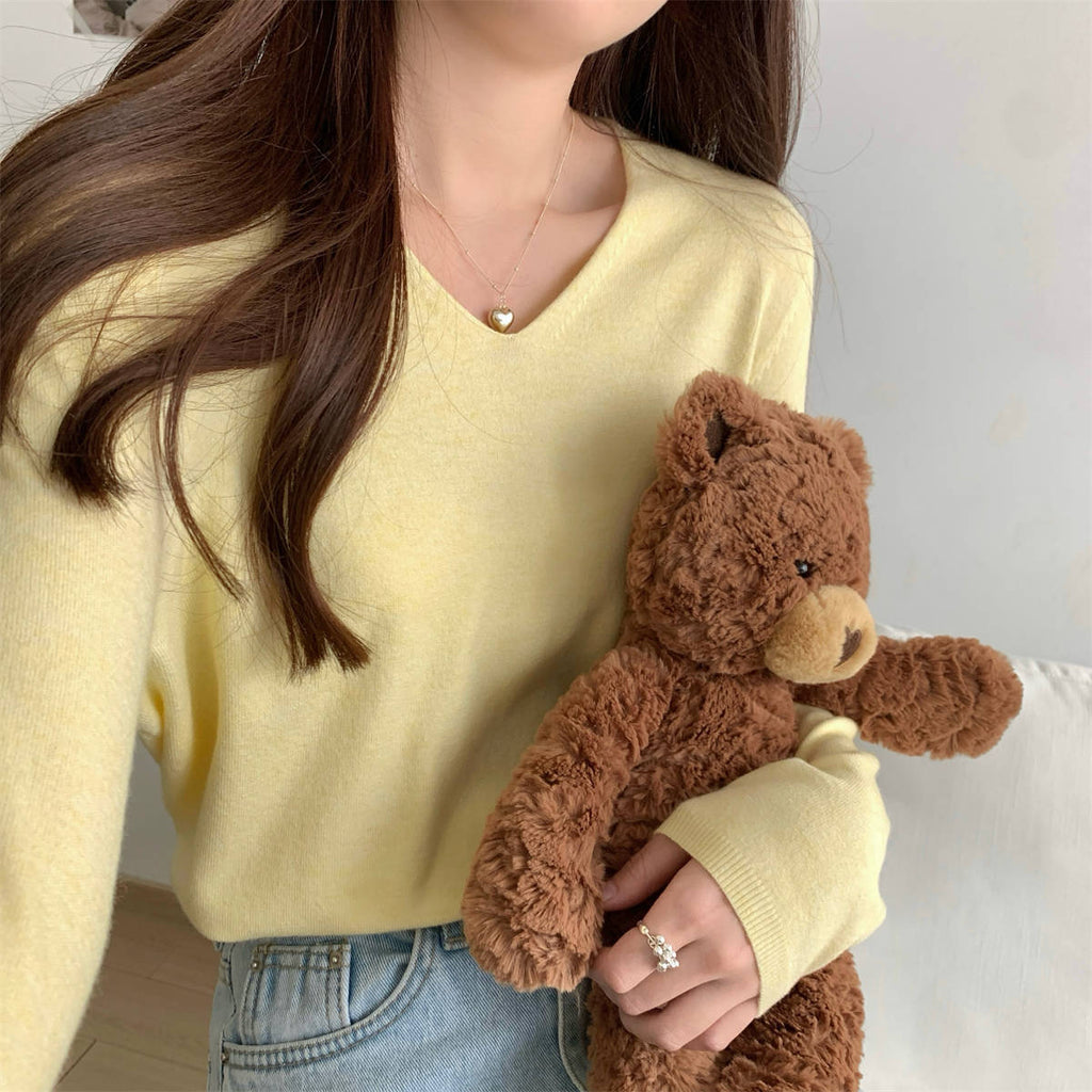 Women's loose V-neck cozy sweater with soft fabric, ideal for layering, by Dropshipman.