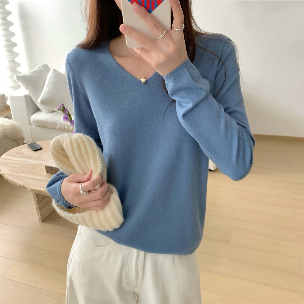 Women's loose V-neck cozy sweater, soft and comfortable, ideal for layering, by Dropshipman.